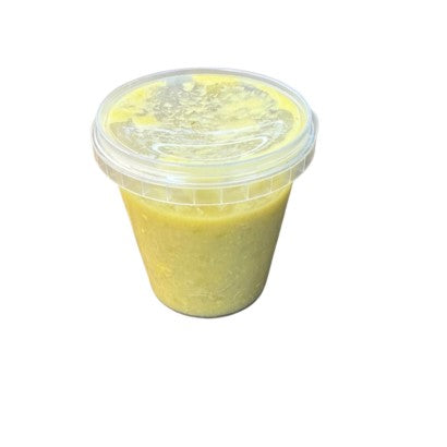 Chicken and Corn Soup in a clear container, warm and comforting, ready to enjoy.