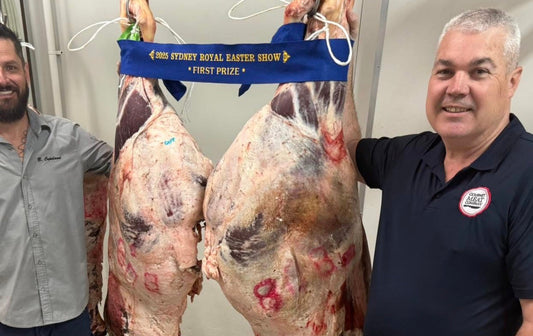 Award-Winning Butcher proudly displays his prize-winning meat at the Sydney Royal Easter Show.