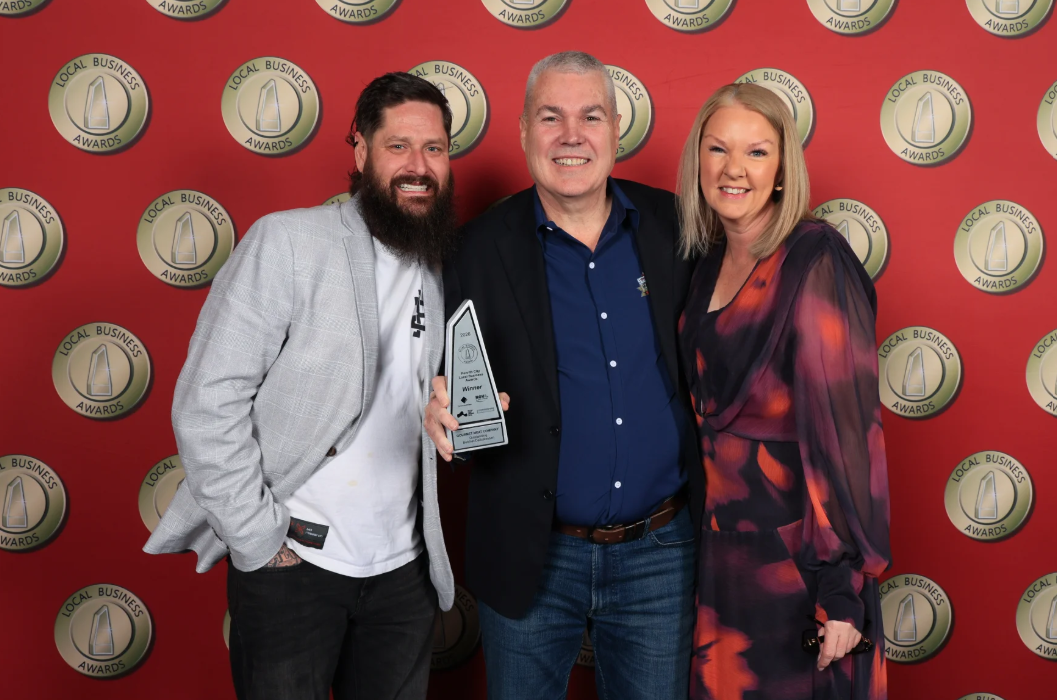2026 Penrith Best Butcher winners holding award at Local Business Awards ceremony.