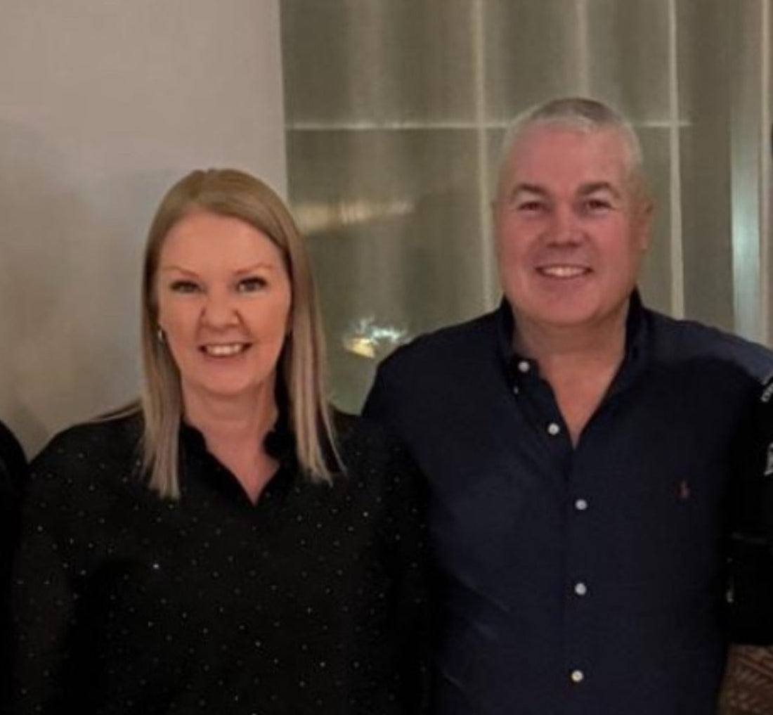 New Owners of My Meat Online standing together, smiling at an indoor event.
