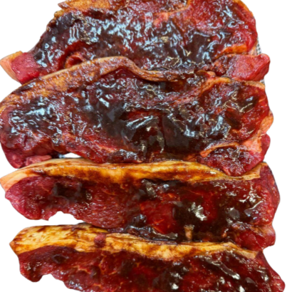 The Long Weekend Pack - Perfect for Families & BBQ Lovers featuring deliciously grilled steaks with barbecue sauce.