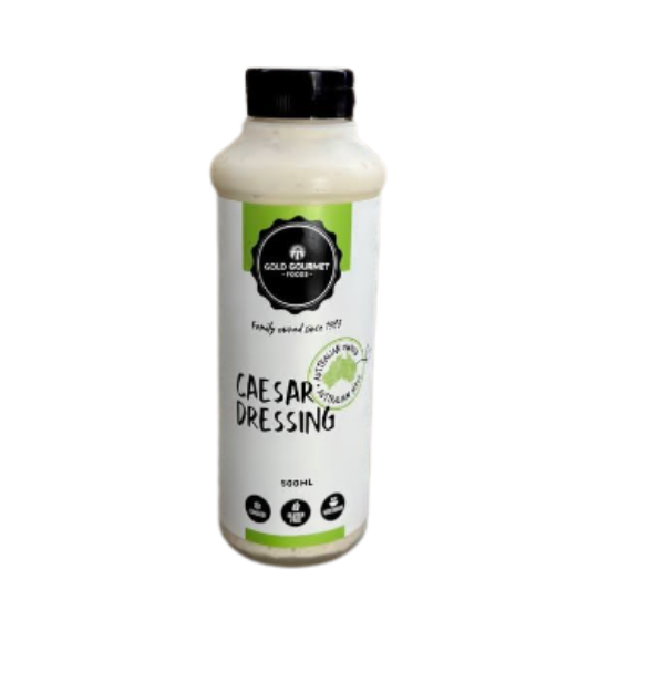 Gold Gourmet Caesar Dressing bottle with green label and white sauce, perfect for salads and recipes.
