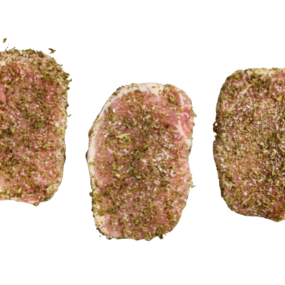 Pork Scotch Fillets with Garlic seasoning, three seasoned pork fillets on a white background.